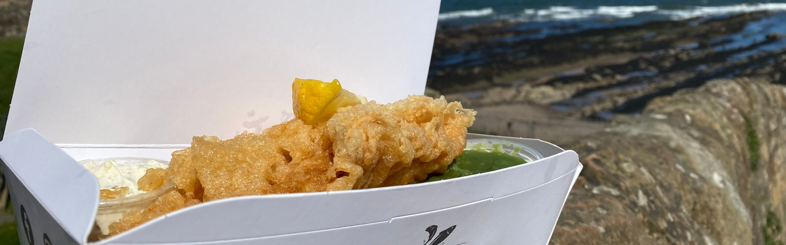 Takeaway fish and chips by the beach in St Andrews