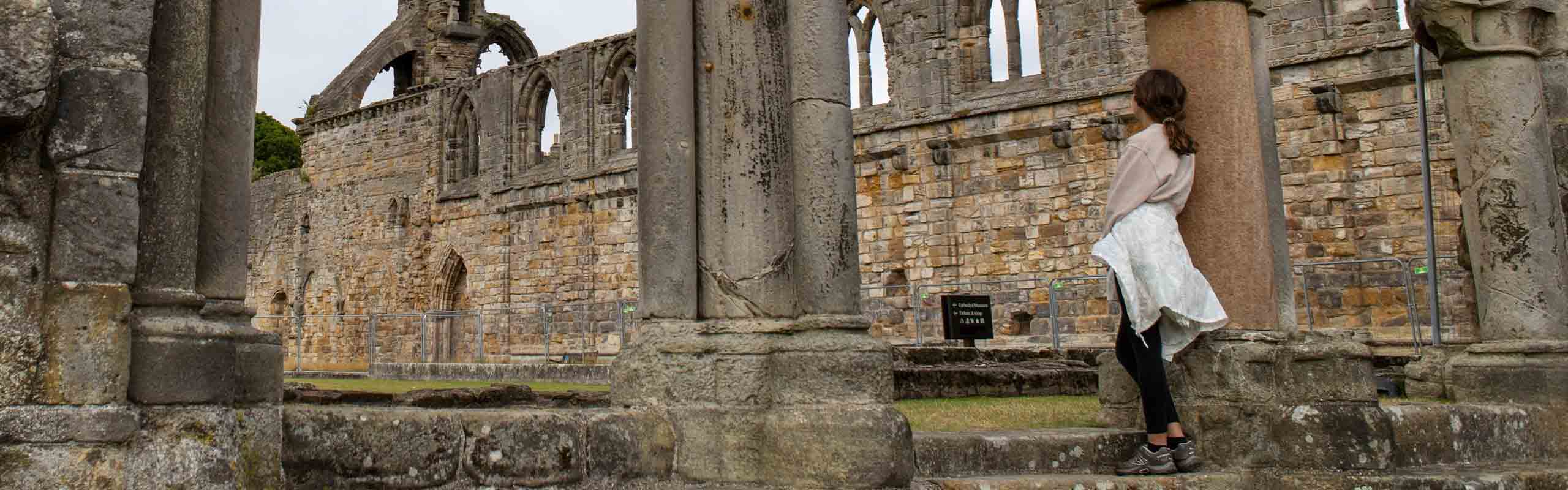 A tourist at St Andrews Cathedral